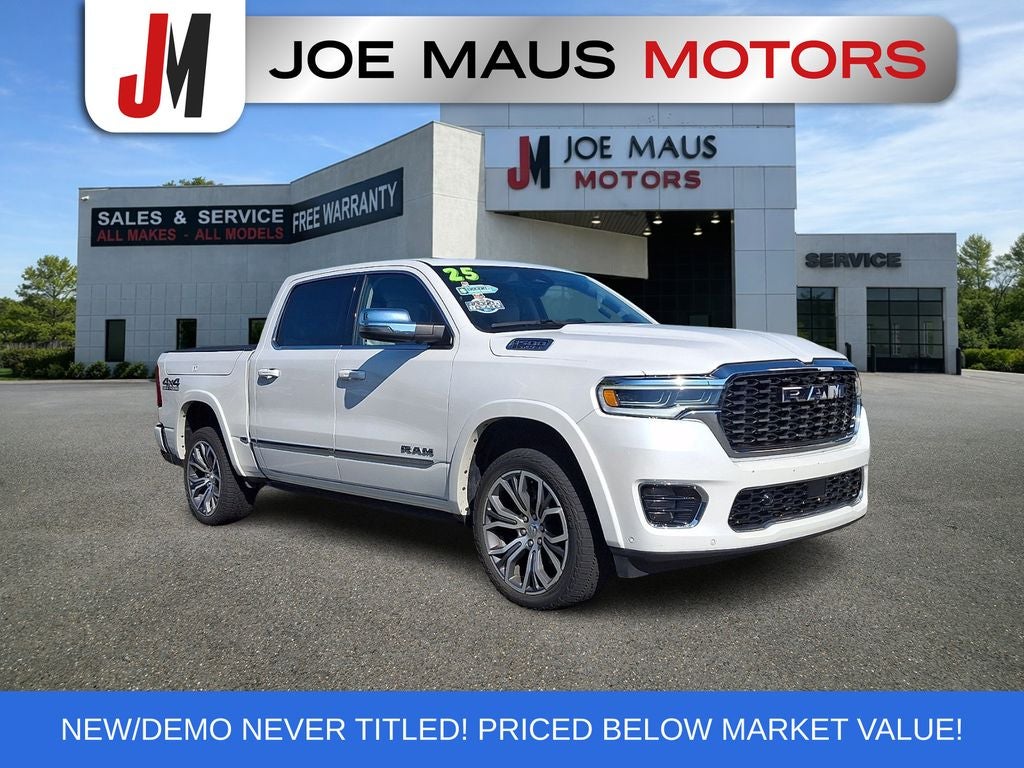 2025 RAM 1500 Tungsten in Ivory White Tri-Coat Pearlcoat — front three-quarter view