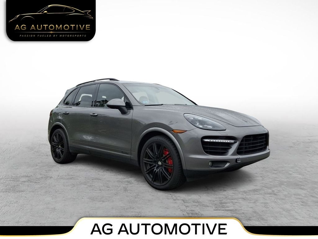 2014 Porsche Cayenne Turbo in Meteor Gray Metallic — front three-quarter view